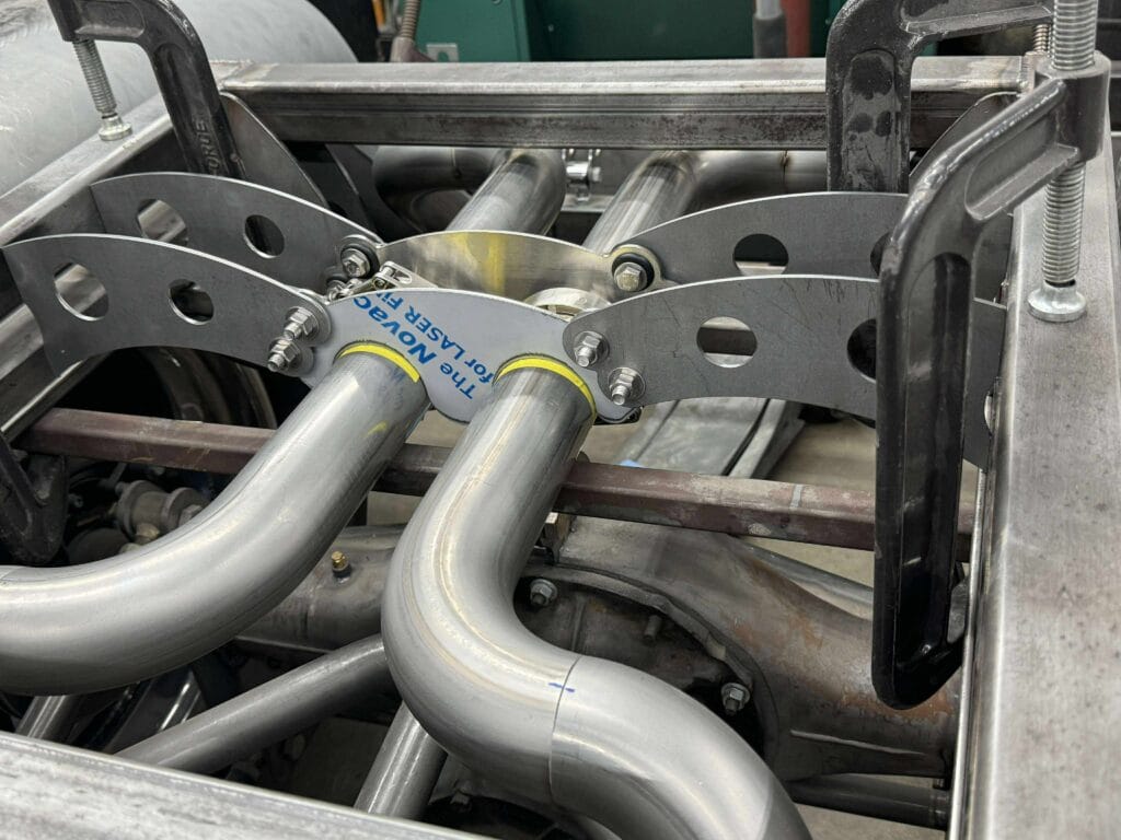 Stainless merge and custom brackets clamped in place