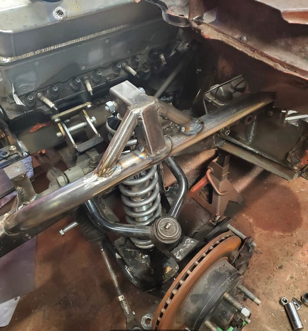 Custom front suspension and fabricated control arm setup on the 1974 Ford Pinto “Chinto” during garage-built race car construction
