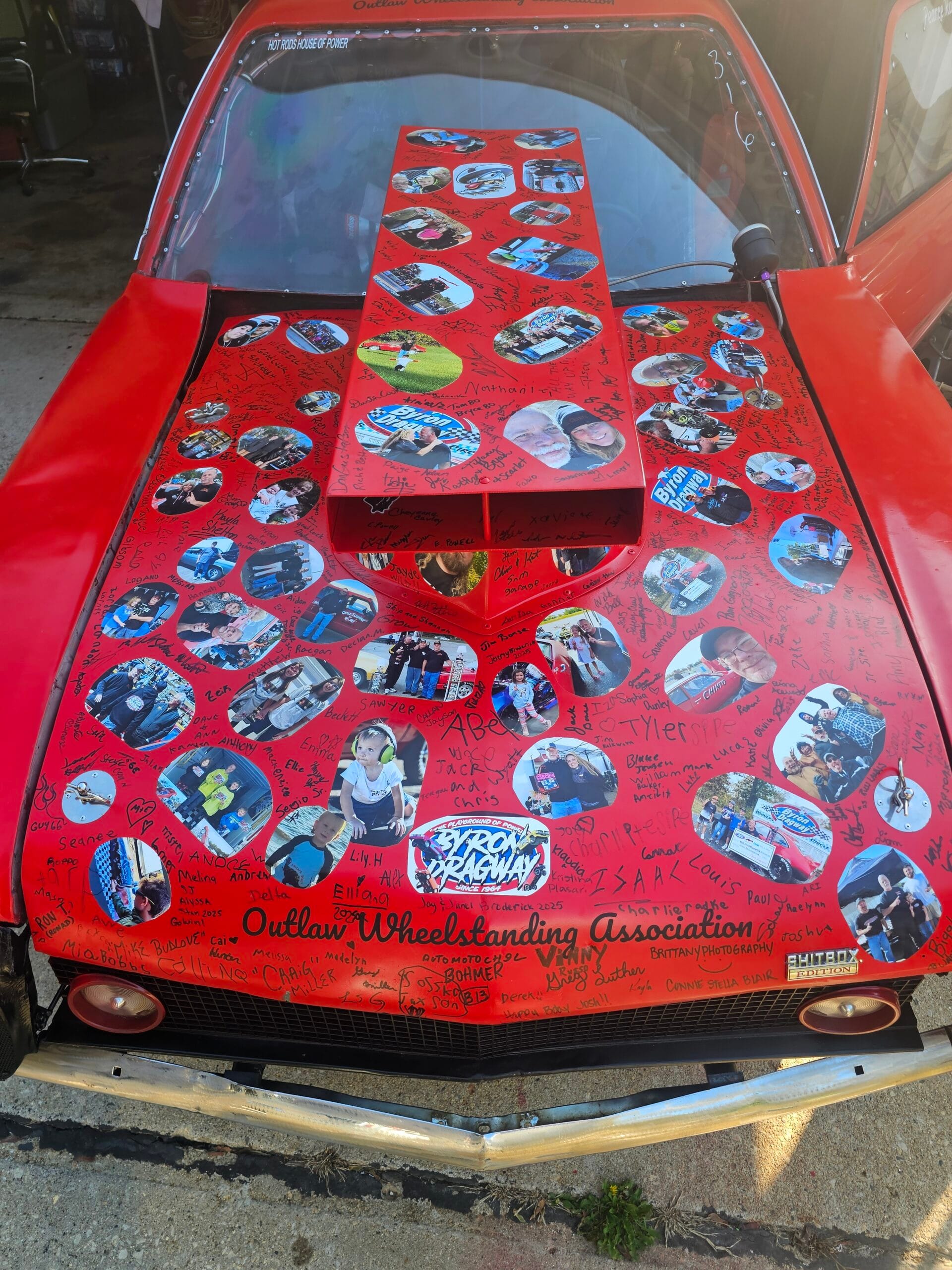 Signed hood from the 1974 Ford Pinto “Chinto” covered with fan signatures and photos from Outlaw Wheelstanding Association events